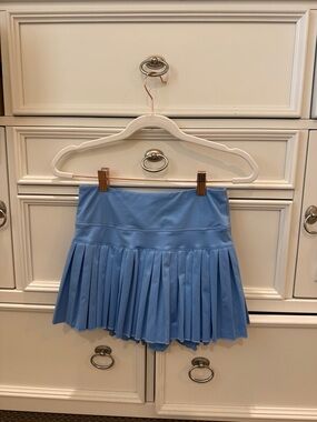 Gold hinge blue skirt